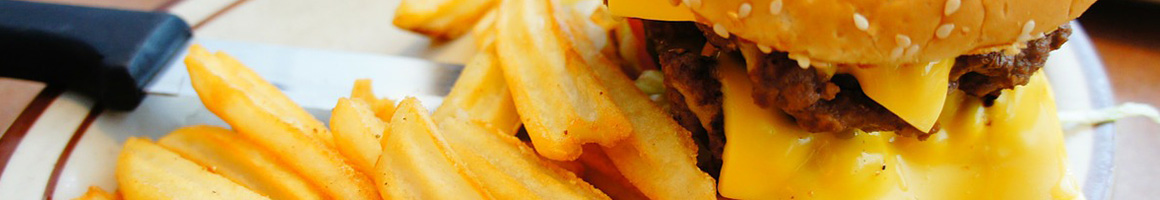 Eating Barbeque Burger Food Stand at Lariat Bar-B-Q restaurant in Yakima, WA.